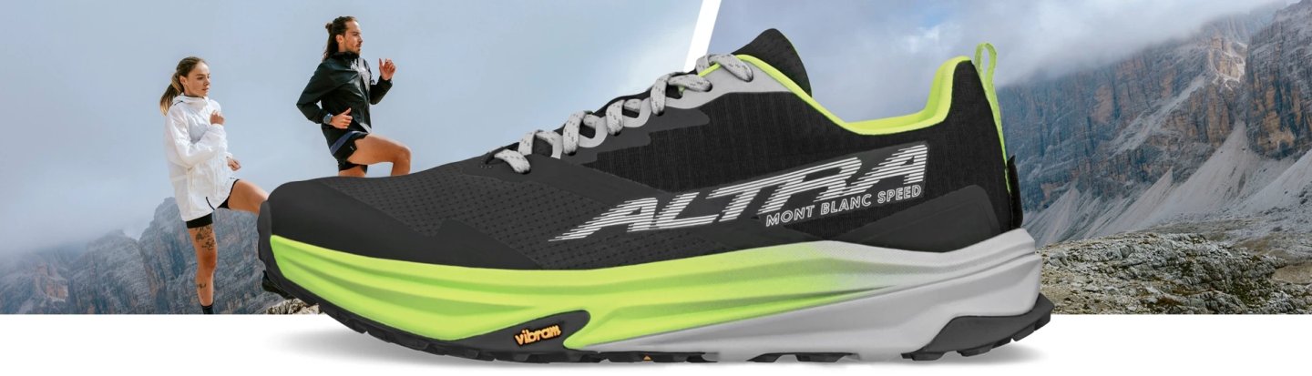 Altra Mont Blanc Speed trail running shoe in black and lime green with Vibram outsole, shown against a mountain backdrop.