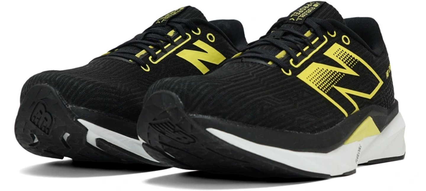 New Balance FuelCell Propel v5 running shoes in black with yellow N logo and white FuelCell midsole
