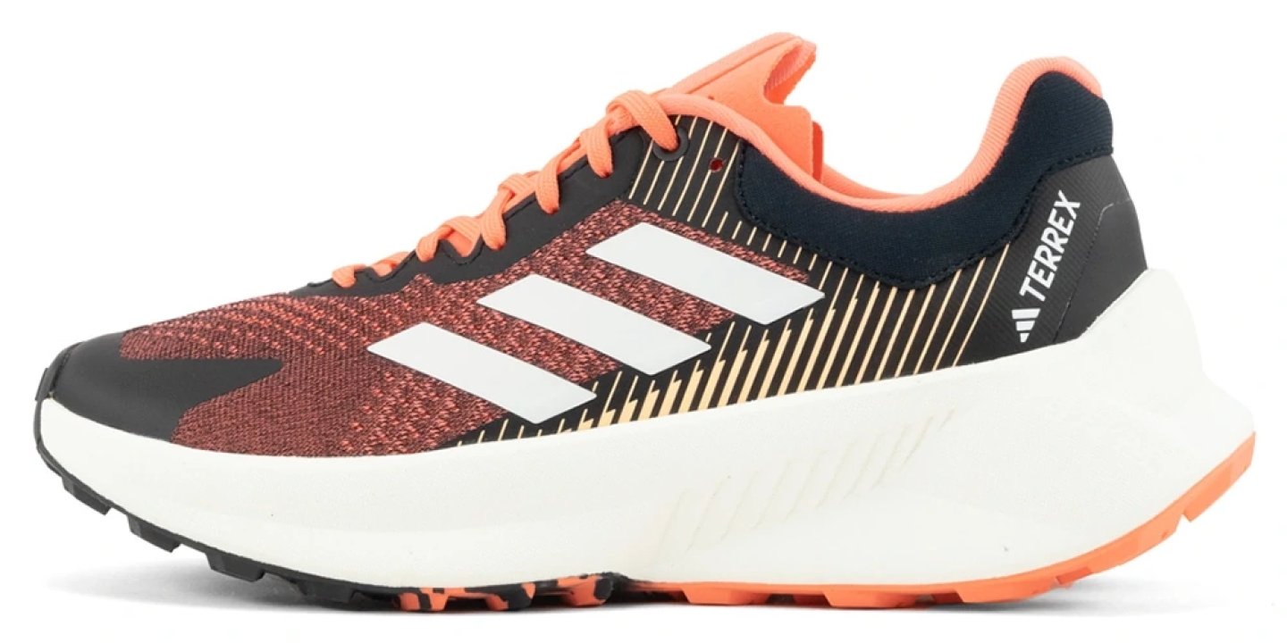Adidas Terrex Soulstride trail running shoe in coral orange and black with white Boost midsole, lateral view
