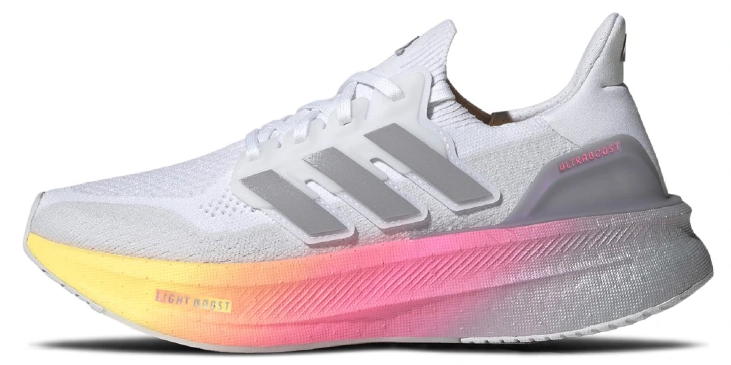 Adidas Ultraboost 5 running shoe in white with silver three stripes and a gradient yellow-to-pink Light Boost midsole