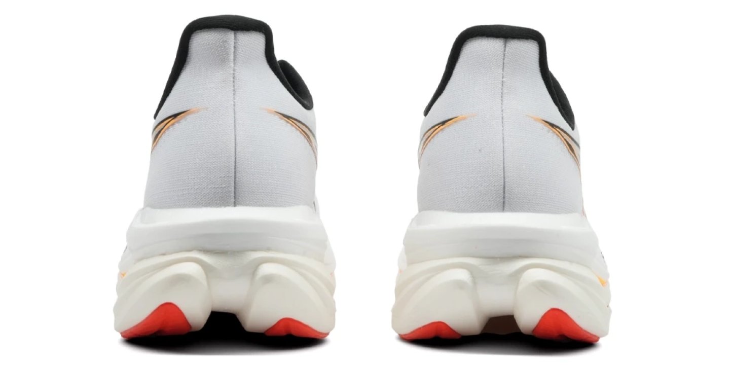 Rear view of a pair of Asics Sonic Blast 2 Ignite running shoes with white upper, black collar, orange logo, and red outsole.