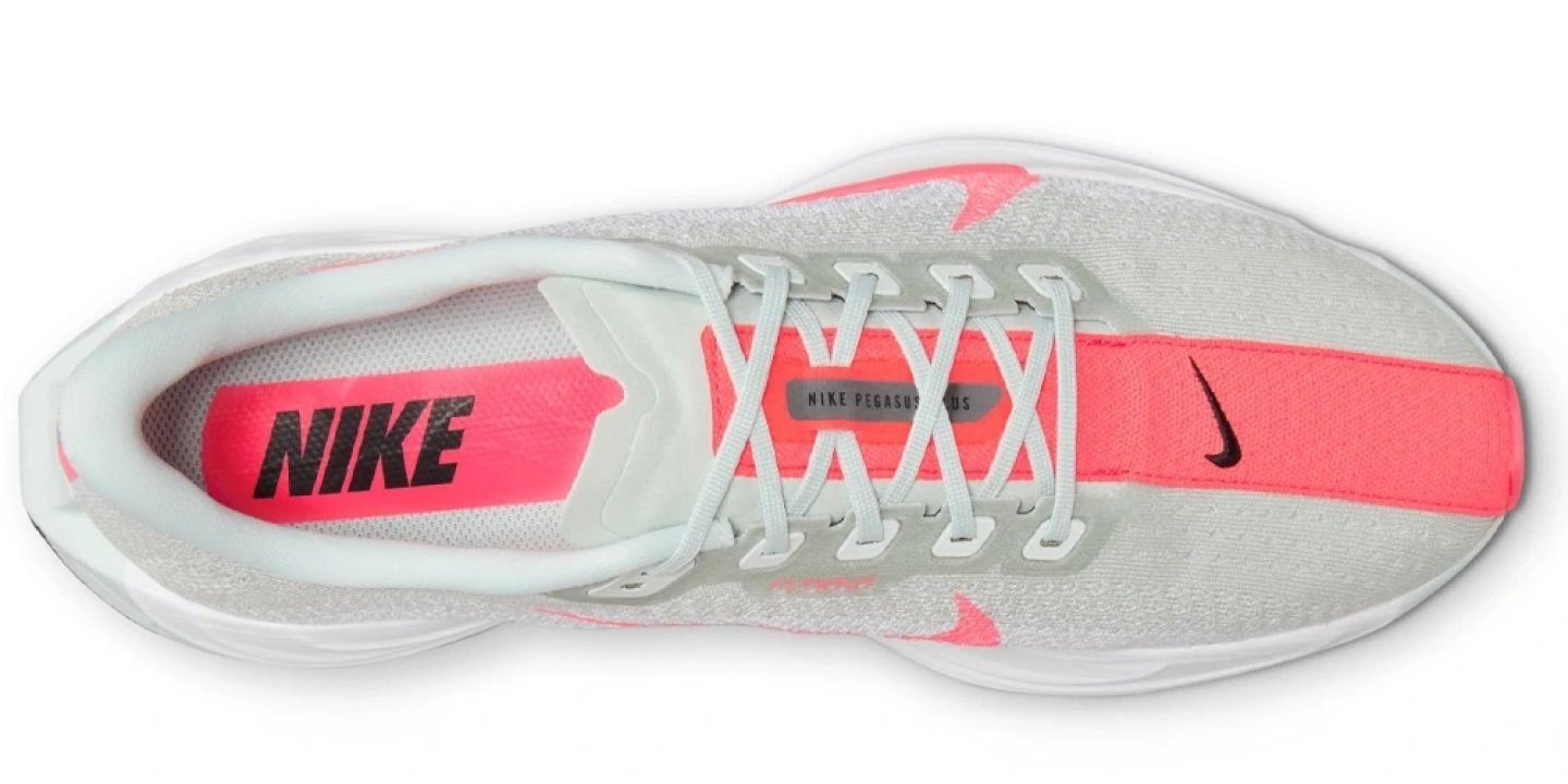 Nike Pegasus Plus running shoe top view, light grey breathable mesh upper with hot coral Swoosh and lace detailing