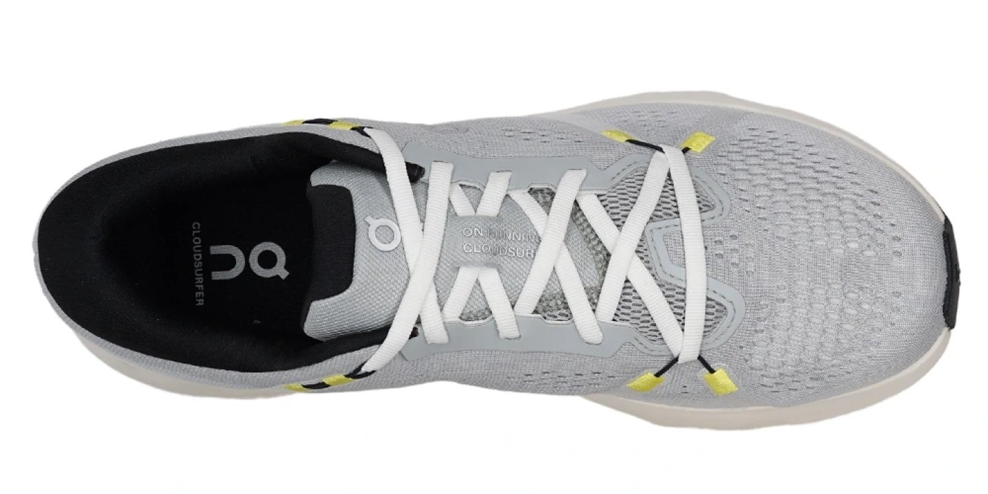 On Cloudsurfer 2 running shoe seen from above, glacier grey mesh upper with white laces and yellow eyelets