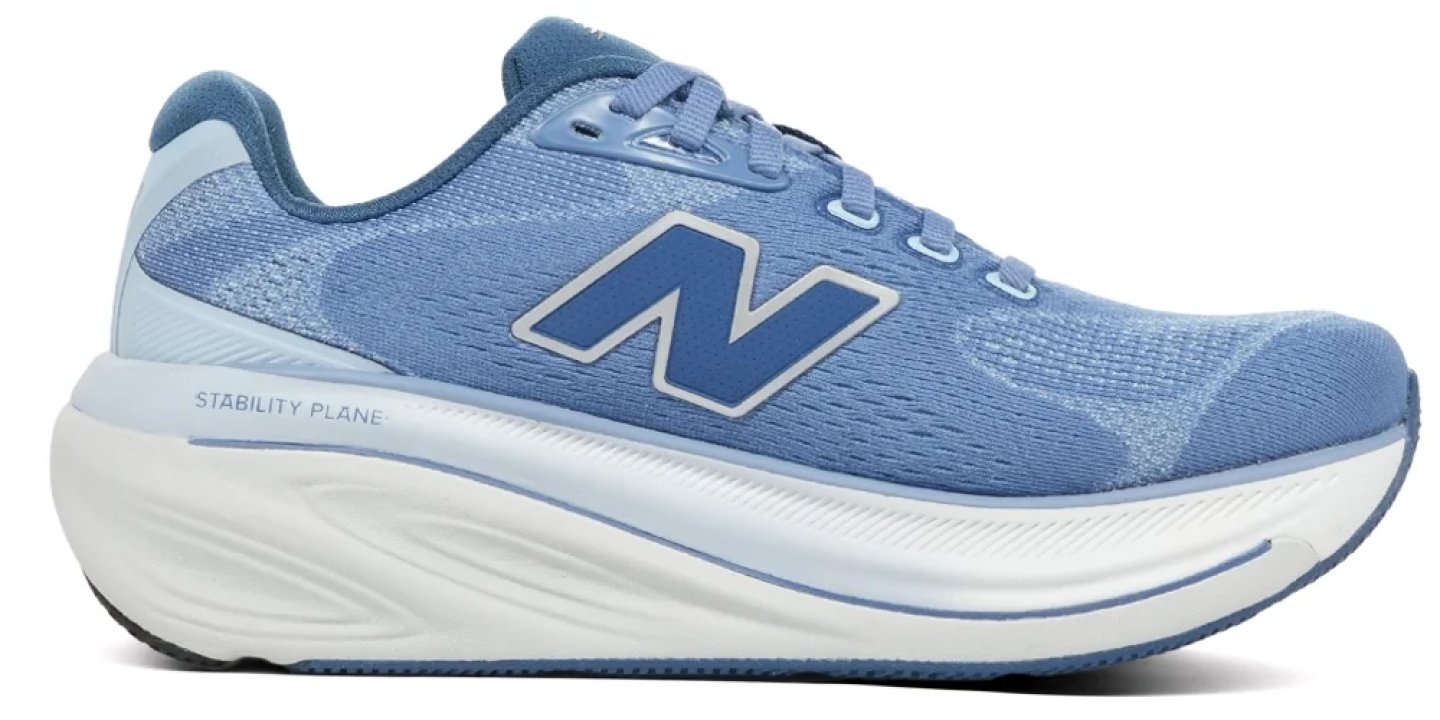 New Balance women's blue stability running shoe with white rocker midsole and Stability Plane branding, lateral view.