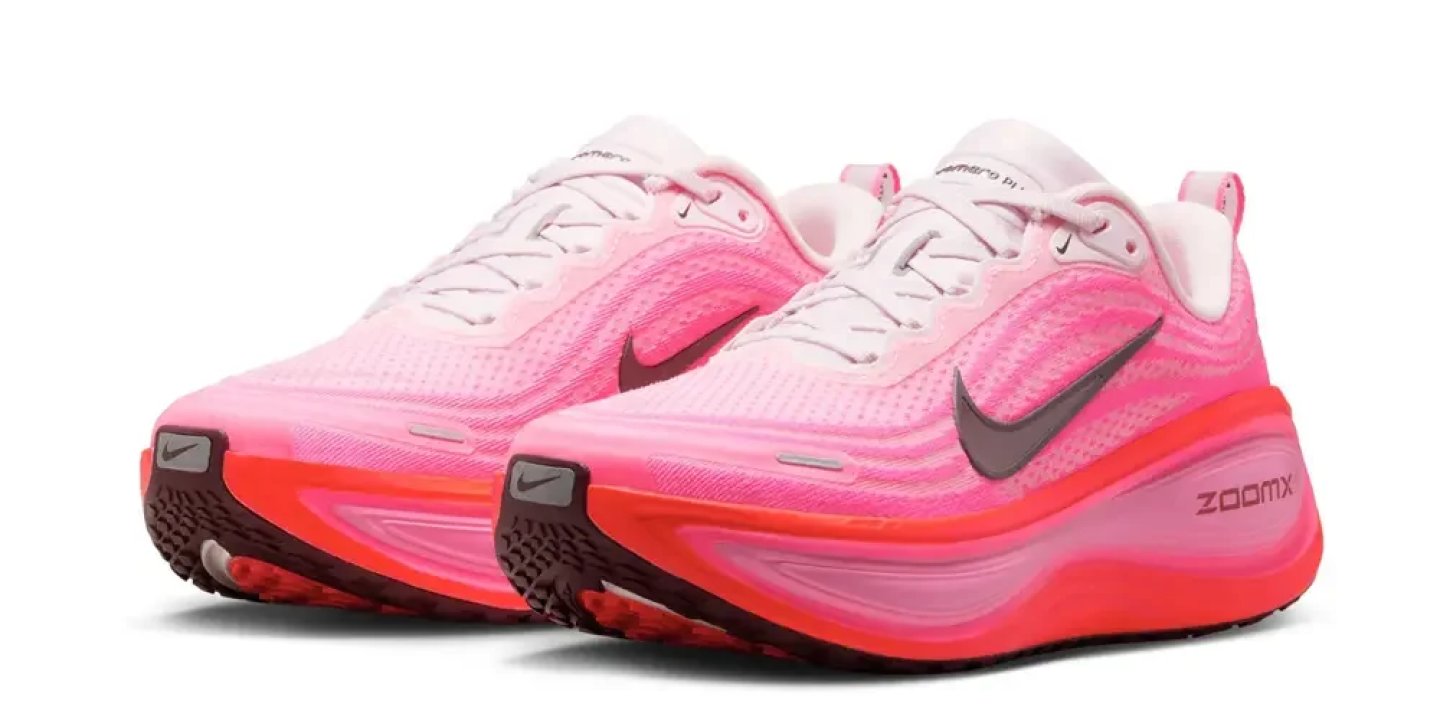 Nike ZoomX women's running shoes in gradient pink and coral with mesh upper and ZoomX foam midsole.