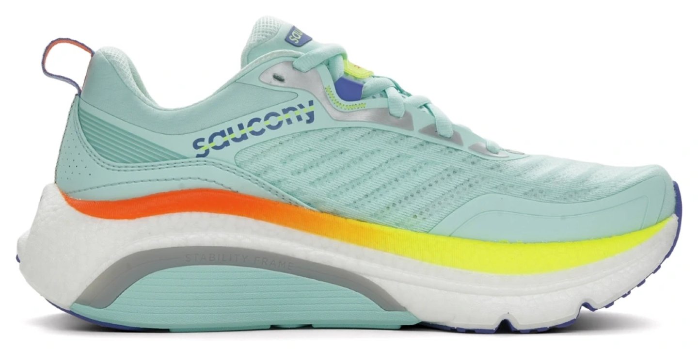 Saucony Guide stability running shoe in mint green with orange yellow and blue midsole accents, lateral side view