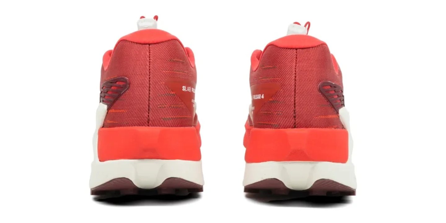 Rear view of a pair of Salomon S/Lab Pulsar 4 running shoes in coral red and white on a white background